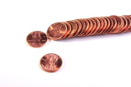 The American cents lie abreast on a white background.の写真素材