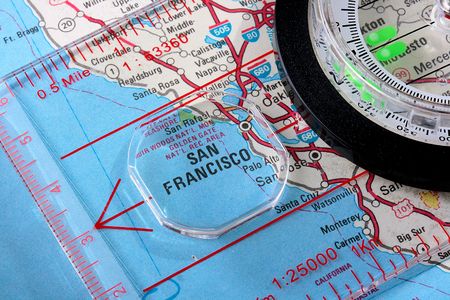 USA map with the city of San Francisco and a compass with magnifying glass over San Francisco.の写真素材