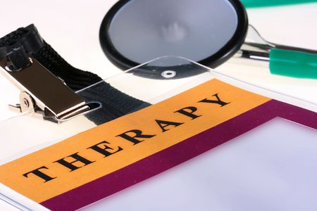 Medical theme - a badge of the doctor of the therapist and a stethoscope.の写真素材