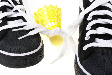 Black sports footwear with the connected laces and a flounce for game in badminton.の写真素材