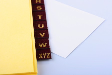 Place for placing business of a card with a folder for the correspondence with the alphabet.の写真素材