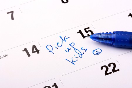 Record in a calendar with reminder Pick up kids.