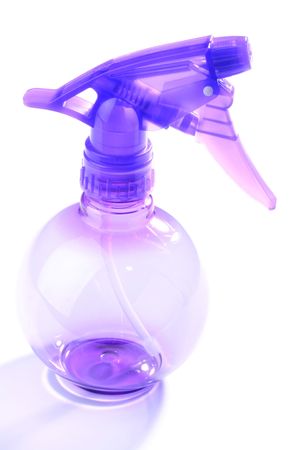 Spray of violet colour on a white surface.の写真素材