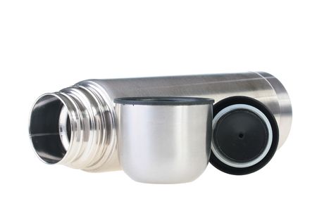 Metal flask for preservation of a hot or cold liquid on a white background.の写真素材