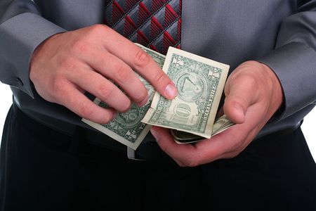 The businessman in a grey shirt and a tie has control over money.