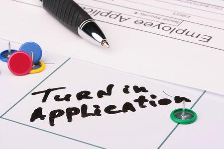 The information on a calendar about giving Application with office accessories.の写真素材