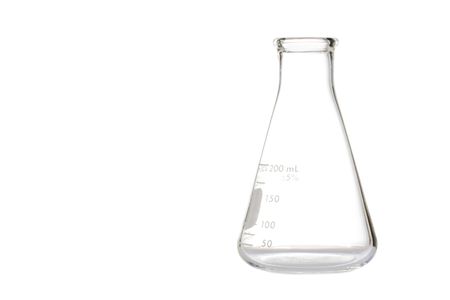 A glass erlenmeyer flask used for measurements isolated on white background.の写真素材