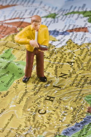 Figure of a human on the map of China.の写真素材