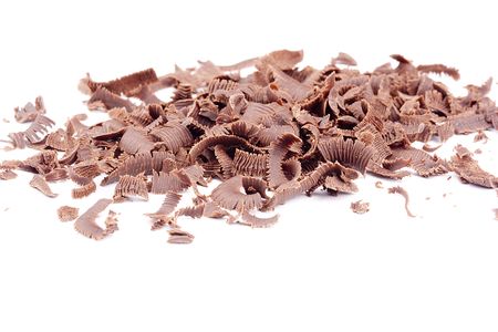 Bitter chocolate in a small crumb on a white background.の写真素材