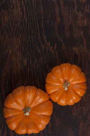 Small orange pumpkins symbolising autumn holidays and used in decorative works.の写真素材
