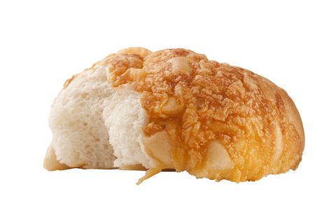 Rich white bread topped with cheese on a white background.の写真素材