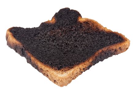 Charred toast after a long stay in the toaster.の写真素材