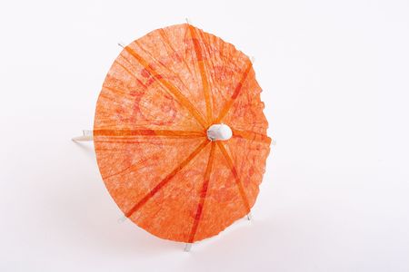 Paper umbrella to decorate the glasses with a cocktail.の写真素材