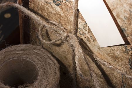 Archival book in a book-depository are tied up by a cord.の写真素材