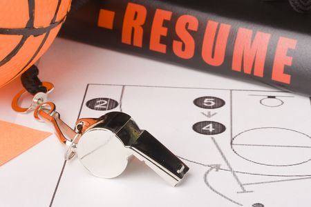 Equipment and a resume of a very experienced basketball coach.の写真素材