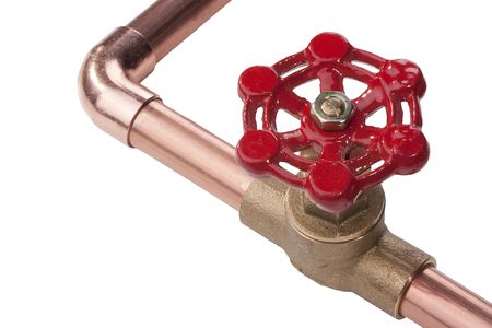 Plumbing copper pipe with a brass valve on a white background.の写真素材
