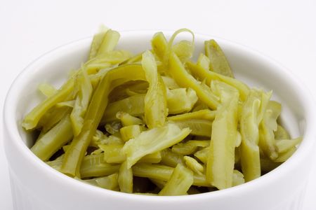 Chopped chillies marinated green beans from the metal cans.