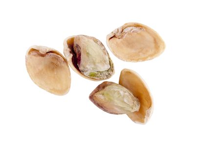 Open pistachios isolated on a white background.