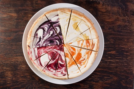 Cheesecake stuffed with lemon, peach, wild berry and strowberry.の写真素材