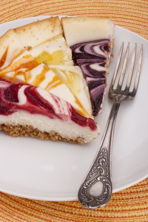 Cheesecake stuffed with lemon, peach, wild berry and strowberry.の写真素材