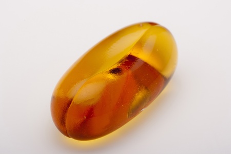 Medical pill against diseases on a white background.の写真素材