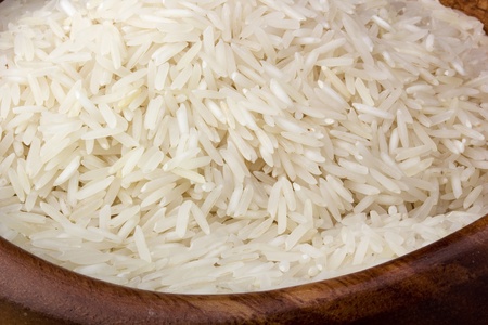Close-up of white rice in a brown plate.の写真素材