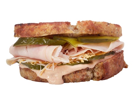 Sandwich with meat, pickles, and cheese isolated on a white background.の写真素材