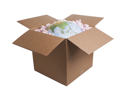 Globe in a cardboard box isolated on a white background.