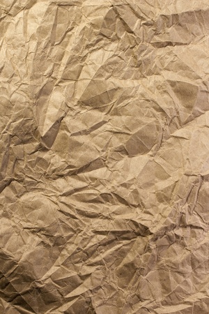 Photograph of wrinkled brown paper for use as a background. Add your text to the background.の写真素材