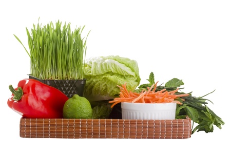 Tray of vegetables isolated on a white background.