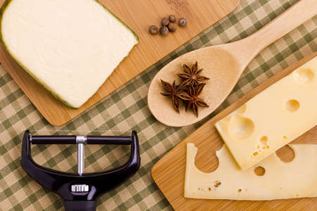 A piece of delicious fresh cheese on the kitchen blackboard.