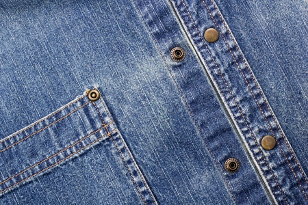 Close-up photograph of deep blue denim material.