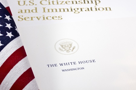 Photograph of a U.S. Department of Homeland Security logo under a paper with the White House seal.のeditorial素材
