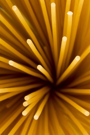 Directly above photograph of yellow pasta sticks の写真素材
