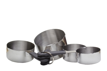 Close-up photograph of measuring cups on a white background.の写真素材