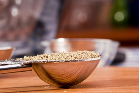 Close-up photograph of a full measuring cup.の写真素材
