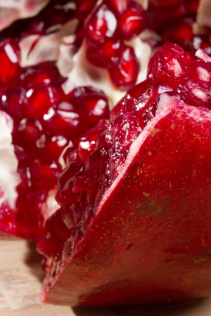 The fruit of Pomegranate on the kitchen blackboard.の写真素材