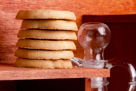 Cookies from dough on a wooden shelf.の写真素材