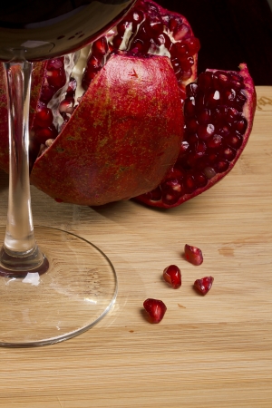 The fruit of Pomegranate on the kitchen blackboard.の写真素材