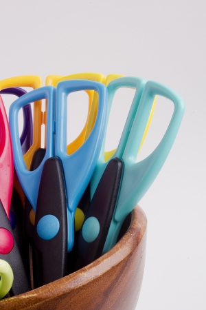 Scissors for decorative works in a wooden container.の写真素材