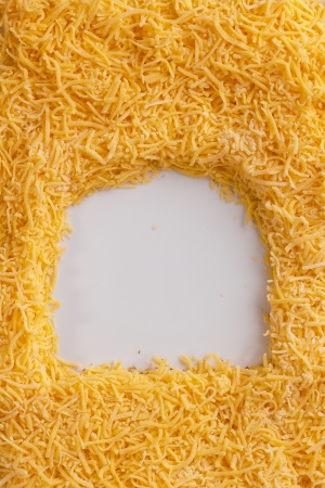 Background consisting of grated cheese for graphic design.の写真素材