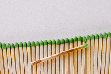 Matches with green work surface for everyday needs.の写真素材