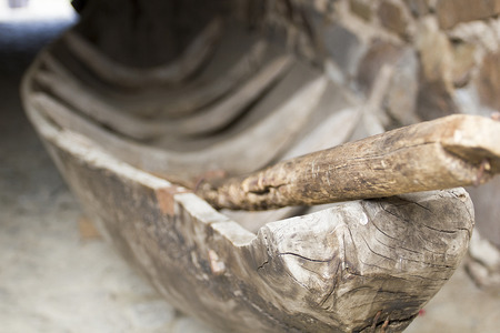 Old rowing boat on the shore for storage.の写真素材