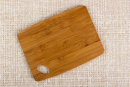Board cooking of bamboo in the background.