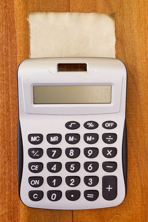 Calculator on the old form paper. Business.の写真素材