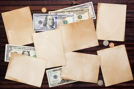 Background with American money and a piece of paper for information.の写真素材