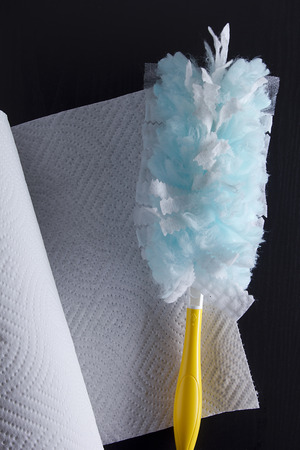 The tool for cleaning dust and paper towel.