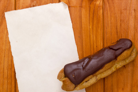 Cake with cream and a piece of paper for placing information.の写真素材