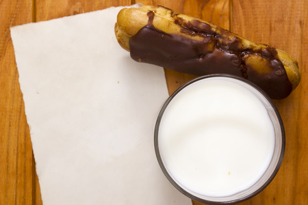 Cake with cream and a piece of paper for placing information.の写真素材