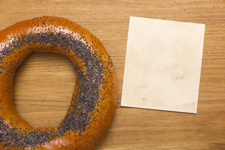 Bagel with poppy seeds, sweet pastries for breakfast.の写真素材